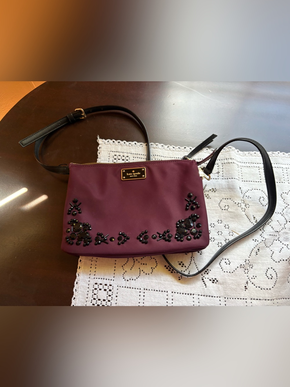 deep plum Kate Spade Wilson Road embellished Madeline nylon crossbody